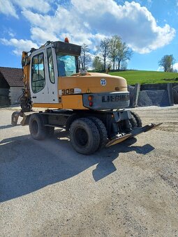 Kolovy bagr rypadlo liebherr 309 - 5
