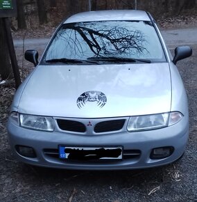 Carisma 1.6 benzín 66kw,rok98 - 5