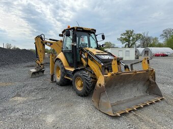 Traktorbagr Cat 428F - 5