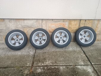 Sada zimních pneu Nokian s alu disky Škoda Fabia 3 - 5