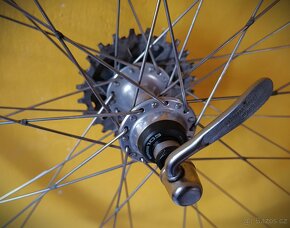 zapletená kola Mavic MA40, náboje Shimano 105 - 5