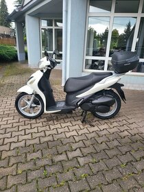 Suzuki SIXteen 125 - 5