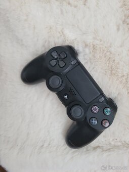 Playstation 4 slim 1tb a 24 her - 5
