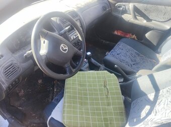 Mazda 323 F , 1,5 - 5