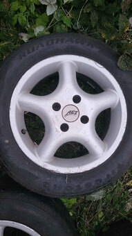 kola R15 4x108 pneu firestone 5 mm - 5
