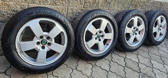 Originál alu Škoda O1 5x100 205/55 R16 letní - 7mm - 5