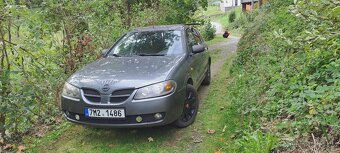 Nissan almera 1,5 - 5