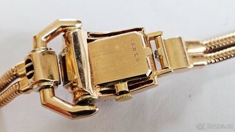 Zlatý náramek-hodinky zn. Omega s brilianty a rubíny 3,87ct. - 5