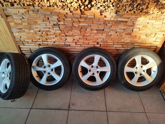Kompletní originál letní kola Mazda3 - 5