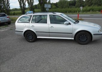 Škoda Octavia 1,6 75 kW KLIMA Historie benzín - 5
