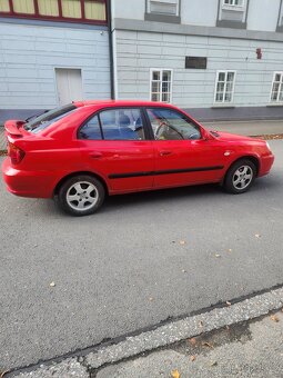 Hyundai acent 1.4 rok 2004 - 5