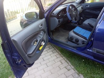 Nissan Almera 1,5 - 5