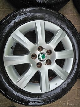 ALU kola letní Škoda 5x100 Fabia II Roomster R15 - 5