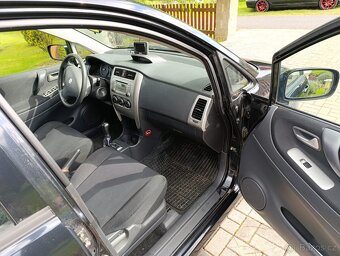 Prodám Suzuki Liana 1,6i , 4x4 , dovoz - 5