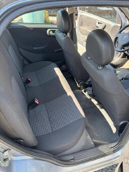 Opel Corsa C 1,2 59kW, r.v. 2004 - 5
