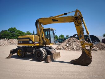 Kolové rypadlo CAT M315 - 5