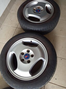 4 originální R15 Alu disky s pneu na Saab 900, Saab 9-3 - 5