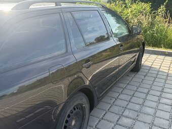 Škoda oktavia 1:6 77kw 2009 rok ma najeto 220000 - 5