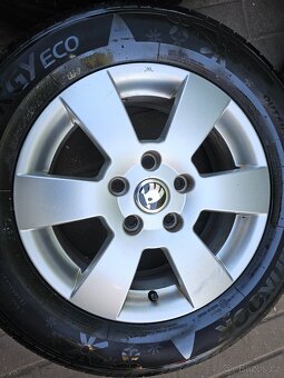ALU letní kola Deimos orig Škoda 5x112 Octavia II R15 - 5