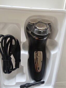 Elektrický rotační holící strojek - 5