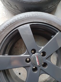5x100 R16 6,5j et 38 Dezent cerne - 5
