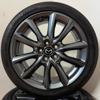 MAZDA 3 5x114,3 R18 ET45+LETNÍ 215/45R18 7,5mm - 5