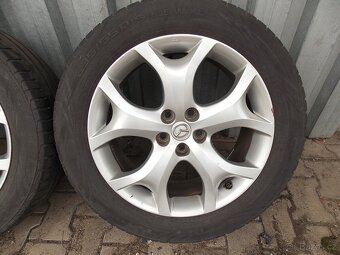 Sada orig. 19" alu kol s pneu Mazda CX7 - 5