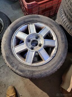 Al Kola Kia 4x114,3mm, díra 67,1mm + 205/60R15 91H - 5