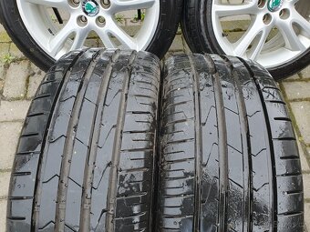 Alu kola Skoda 5x100 r16 6,5j et43 pneu 215/45/16 - 5