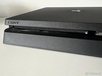 Playstation 4 Slim 1TB + Uncharted - 5