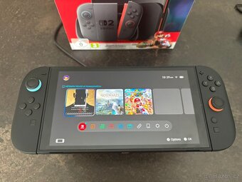 Nintendo Switch 2 + 4 hry , obal - 5