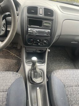 Mazda 323 - 5