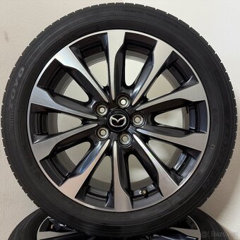 MAZDA CX-3 5x114,3 R18 ET50+LETNÍ 215/50R18 6,5mm - 5
