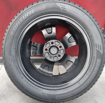 15" -HEZKÁ ČERNÁ ZIMNÍ ALU-KOLA 5x100 RAPID+FÁBIA - 5