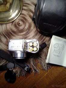 OLYMPUS C-740 ultra zoom. - 5