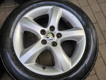 ALU kola letní Škoda 5x100 Fabia II Roomster R15 - 5