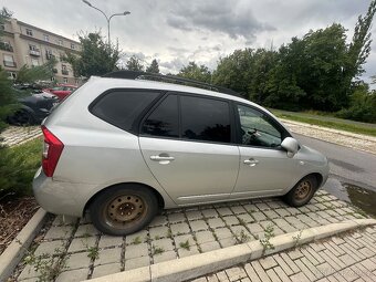 Kia carens - 5