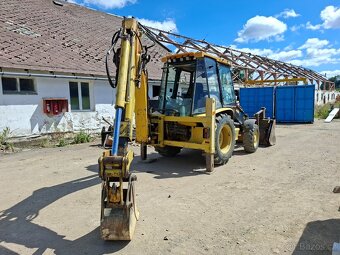 CATERPILLAR 428D 4X4 - 5