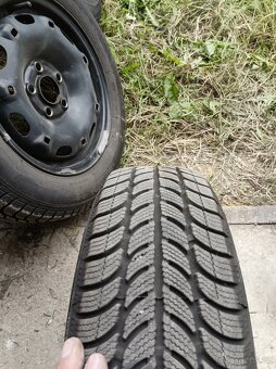 Zimní pneu s disky 165/70 r 14 z fabia 1 - 5