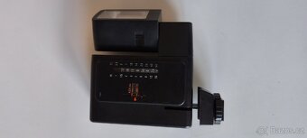 Elektronický blesk Sunpak MX 124 - 5