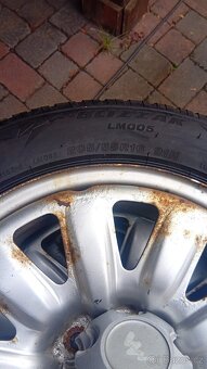 Opel Astra kola 16": plech. disky + zimní pneu - 5