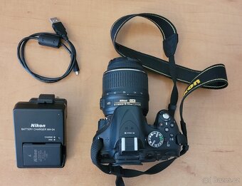 Nikon D5200, nabíječka, baterie, karta 32gb, brašna - 5