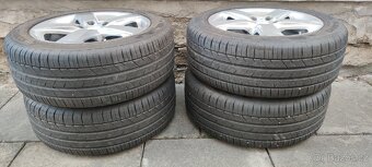ALU s pneu Astra 17/7,5J ET45 - 5