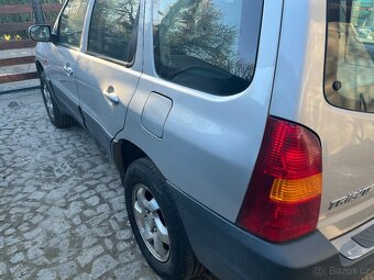 Mazda tribute 2.0 benzin 2004 - 5