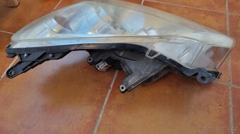 Astra H _světlomet Hella H7 levá - 5