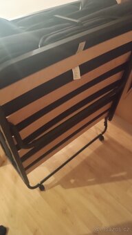 Skládací postel DAMSBRO 90×200 černá

(97) - 5