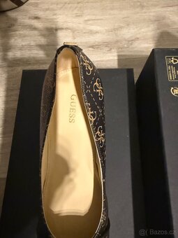 Guess 38 - 5