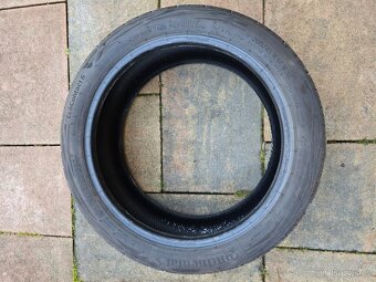 Prodám pneu Continental 205/45 R17 - 5