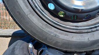 Prodáno - Sada plechových kol Kia s letními pneu 185/65 R15 - 5