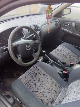 Mazda 323 f - 5